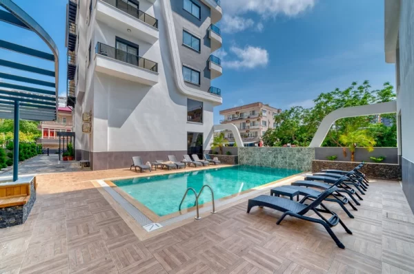 Bu Tek Yatak Odalı Daire ile Alanya'nın Mahmutlar Bölgesinde Modern Yaşamı Deneyimleyin