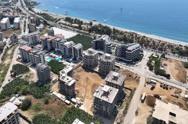 Расслабьтесь в роскоши: апартаменты на продажу в Алании, всего в нескольких шагах от Лазурного моря