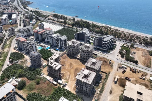 Расслабьтесь в роскоши: апартаменты на продажу в Алании, всего в нескольких шагах от Лазурного моря