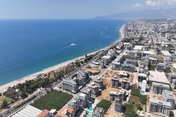 Расслабьтесь в роскоши: апартаменты на продажу в Алании, всего в нескольких шагах от Лазурного моря