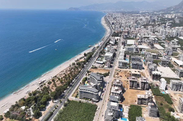 Расслабьтесь в роскоши: апартаменты на продажу в Алании, всего в нескольких шагах от Лазурного моря