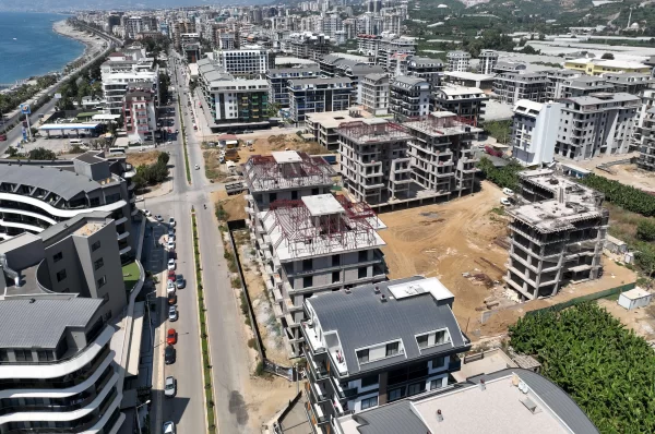 Расслабьтесь в роскоши: апартаменты на продажу в Алании, всего в нескольких шагах от Лазурного моря