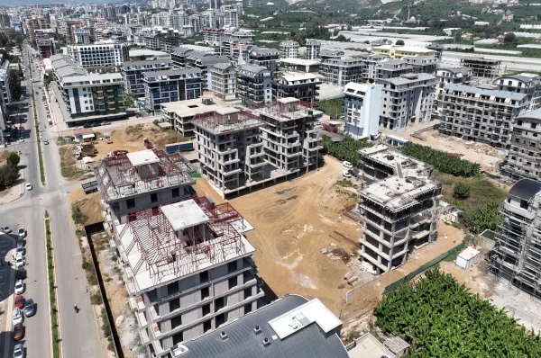 Расслабьтесь в роскоши: апартаменты на продажу в Алании, всего в нескольких шагах от Лазурного моря