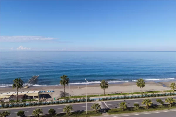 Beachfront Bliss: полностью меблированные апартаменты 1+1 с захватывающим видом на океан