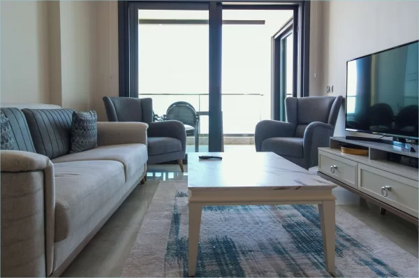 Beachfront Bliss: полностью меблированные апартаменты 1+1 с захватывающим видом на океан