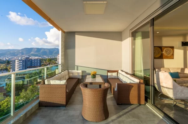 Продажа недвижимости 2+1 в Алании с современной мебелью и роскошным видом на Аланию