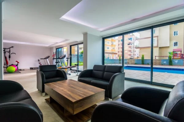 Contemporary Building Meets Comfort: Stylish 1+1 Property in Mahmutlar, Alanya