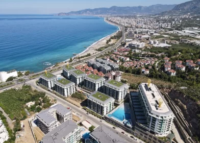 Sea View from Each Corner Beachfront 1+1 Flats and 3+1 Duplexes for Sale in Alanya