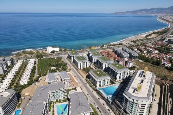 Sea View from Each Corner Beachfront 1+1 Flats and 3+1 Duplexes for Sale in Alanya