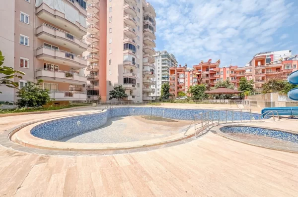 Explore the Fully Furnished High Floor 2+1 Apartment for Sale in Alanya